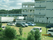 流山市 某物流センター 芝生駐車場